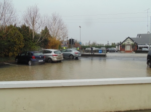 The flooded car park.